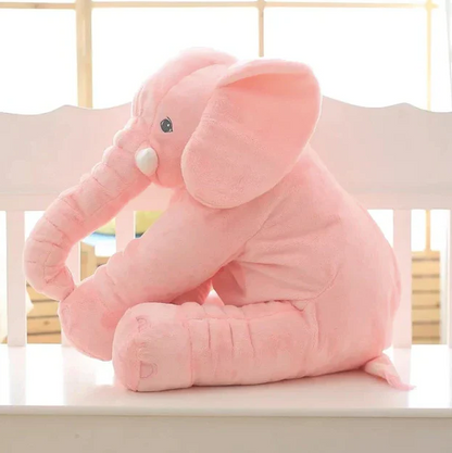 Close-up of textured elephant plush pillow, highlighting its softness for baby's delicate skin.