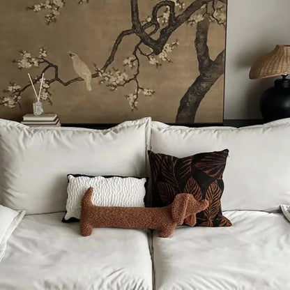 Accent brown Dachshund plush pillow. Soft animal-shaped home decor cushion for cozy spaces.