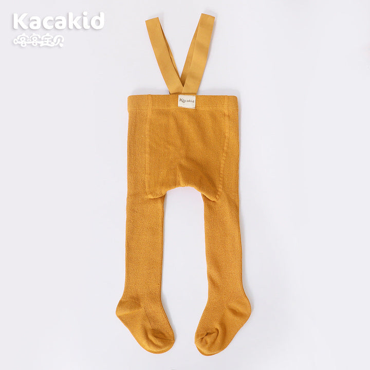 Close-up of soft knitted texture on unisex high-waist baby trousers, showcasing quality.