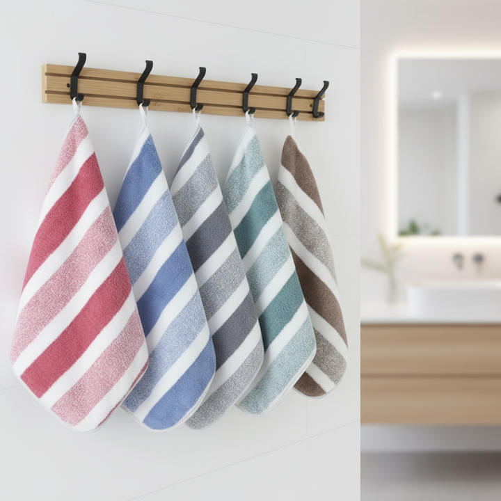 Soft coral fleece towel set, striped, absorbent, quick dry for bathroom.