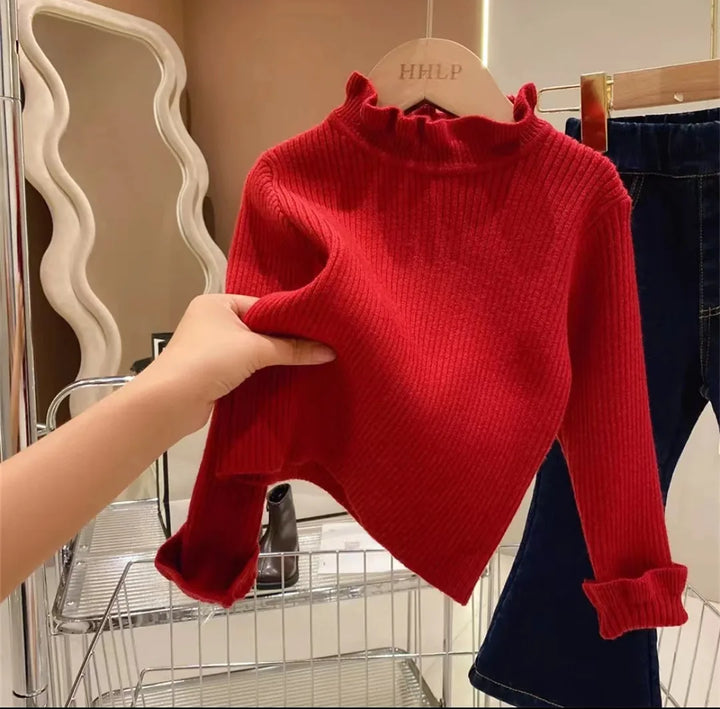 Warm & cozy long-sleeve toddler sweater, essential winter wear for kids. Comfortable children's fashion, perfect for play.