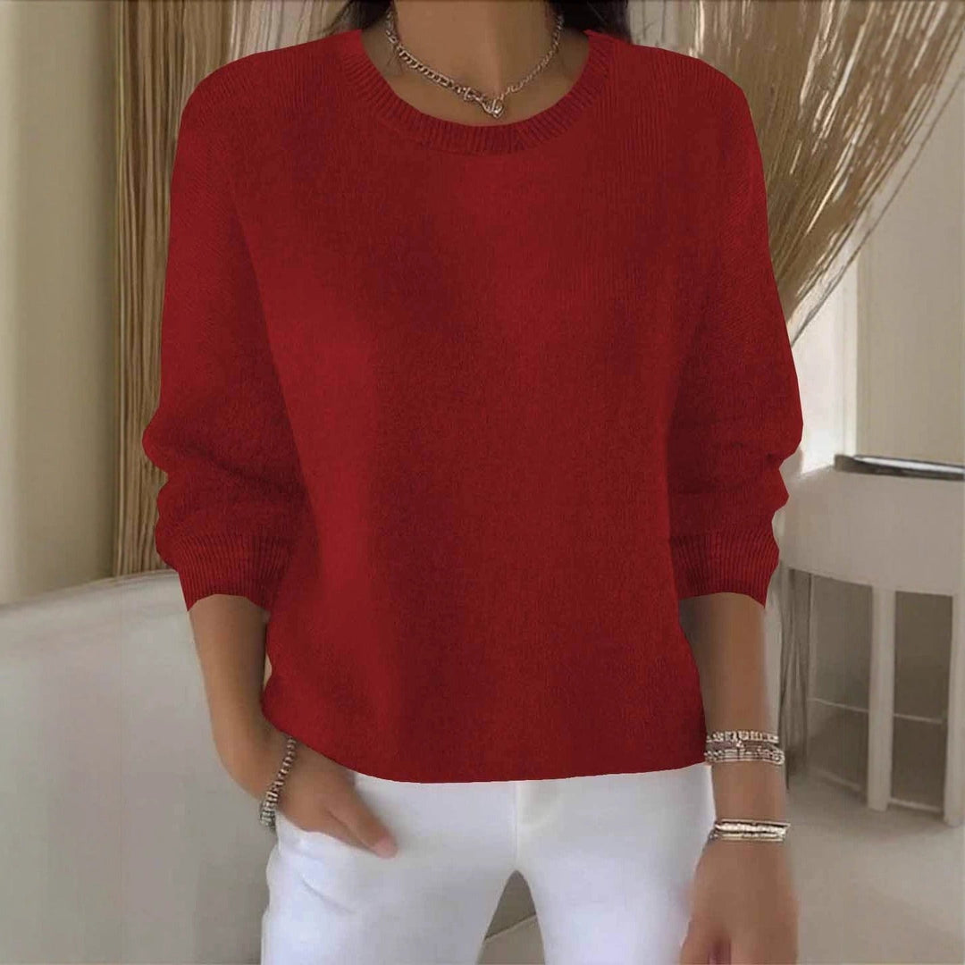 Soft flowy women's knit sweater in a versatile casual chic style.