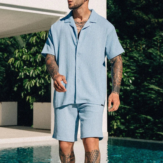Soft green unisex two-piece shorts set for summer, offering casual comfort with lightweight fabric.