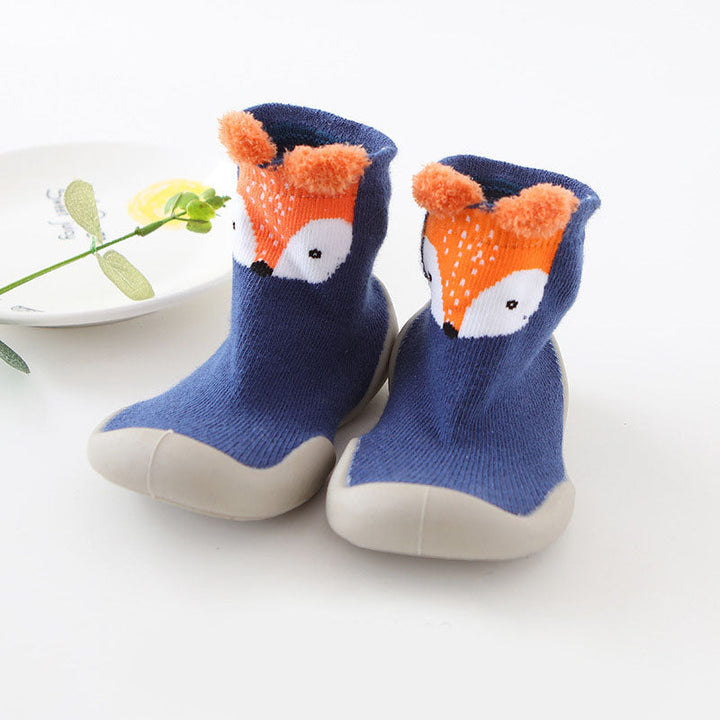 Durable knitted anti-slip toddler shoes, providing warmth & support for active babies' first steps.