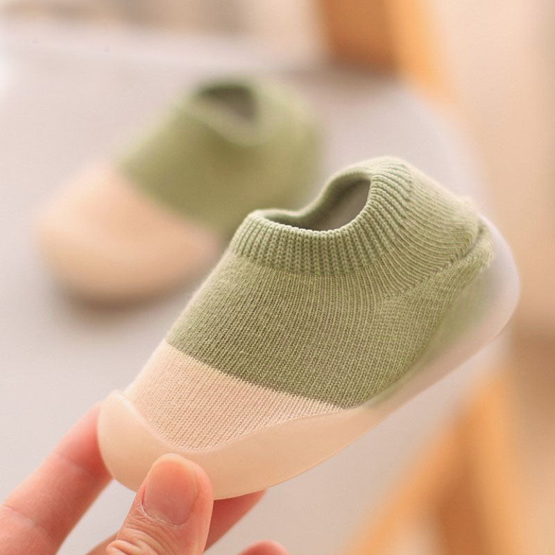 Child-safe anti-slip knitted toddler shoes with soft soles, ideal for indoor & outdoor play.