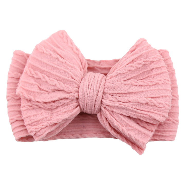 Stylish baby girl gift: soft nylon headband with a chic bow, a lovely child hair accessory.
