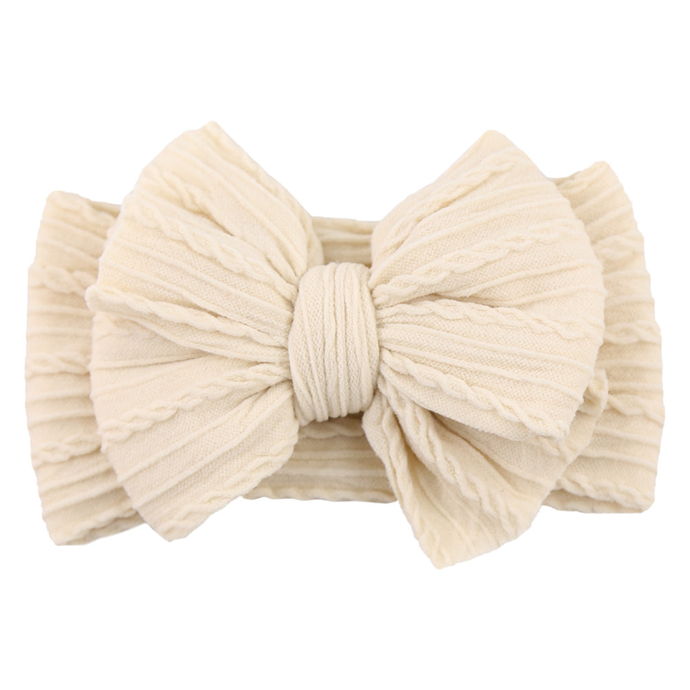 Stylish nylon bow headband, a perfect child hair accessory for baby girls.