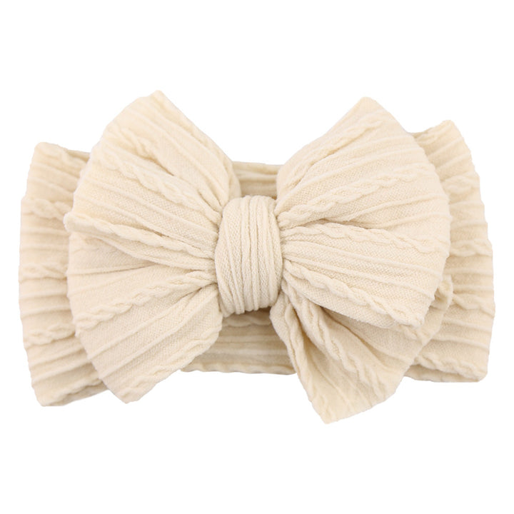 Stylish nylon bow headband, a perfect child hair accessory for baby girls.