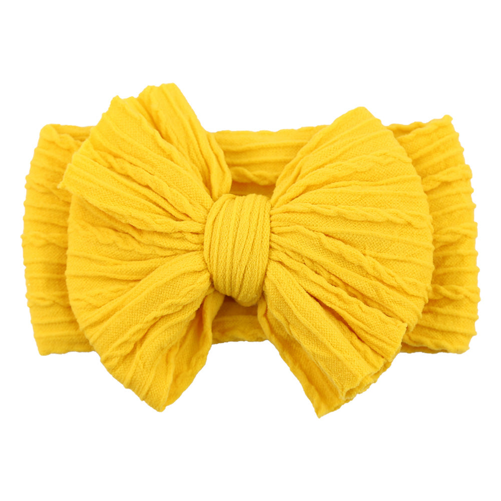 Cute baby headband with a decorative bow, ideal gift for infant girls.