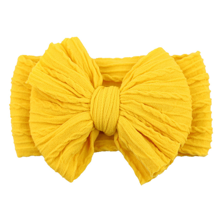 Cute baby headband with a decorative bow, ideal gift for infant girls.