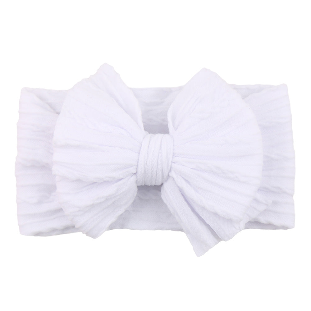 Soft, stretchy nylon baby headband with bow; comfortable for toddlers.
