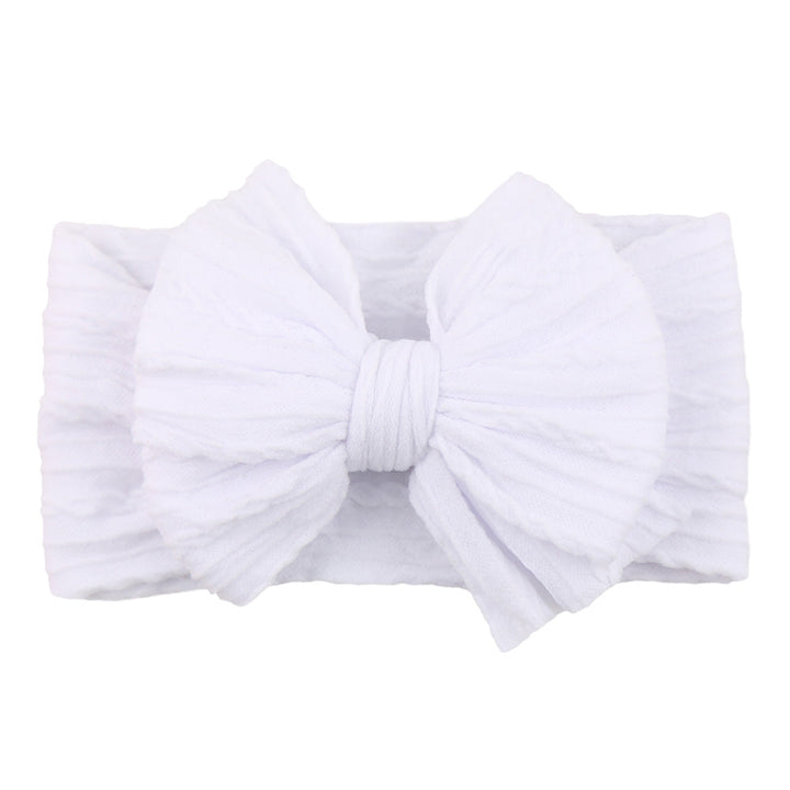 Soft, stretchy nylon baby headband with bow; comfortable for toddlers.