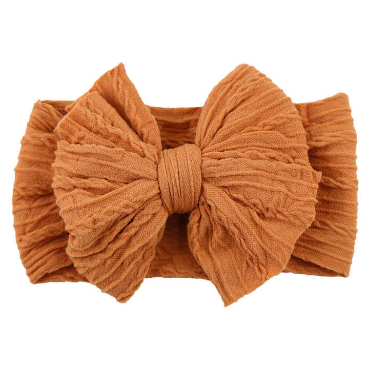 Stretchy & soft baby band with a stylish nylon bow for comfortable wear.