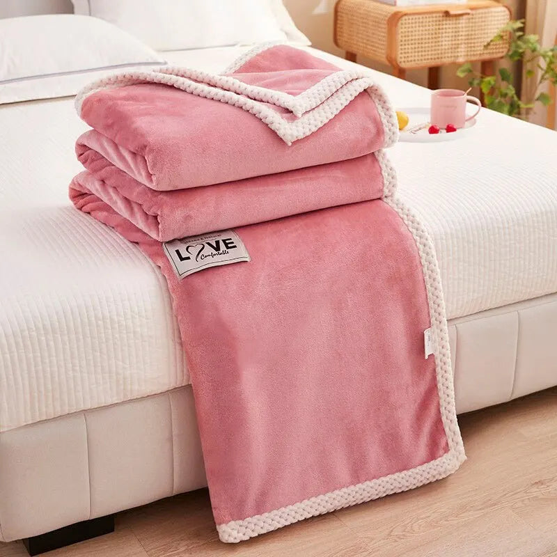 BlushCozy pink flannel fleece blanket, a soft decorative throw for cozy comfort and stylish home decor.
