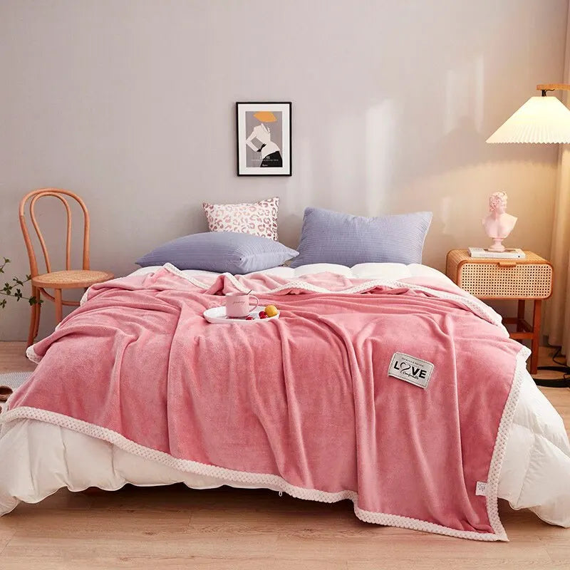 Luxurious soft pink flannel fleece blanket, a plush decorative throw for ultimate comfort & home decor.
