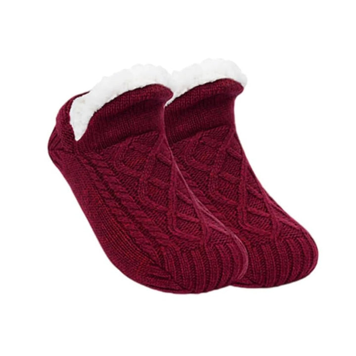 Comfortable plush socks for unisex wear, promoting warm and cozy foot comfort during indoor activities.
