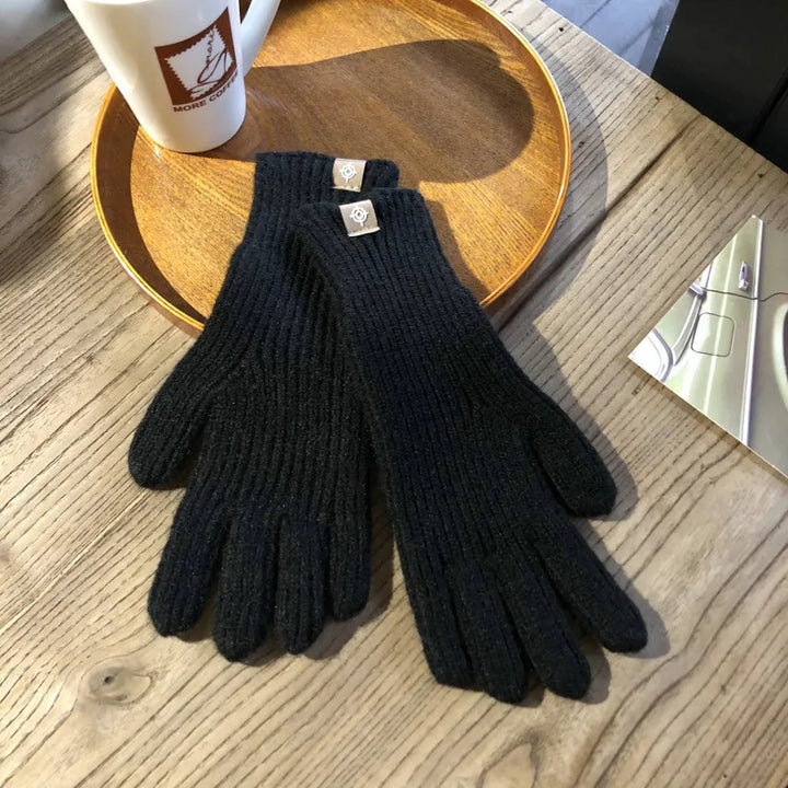 Durable cotton blend soft women's winter gloves, touchscreen compatible for warmth and convenience.