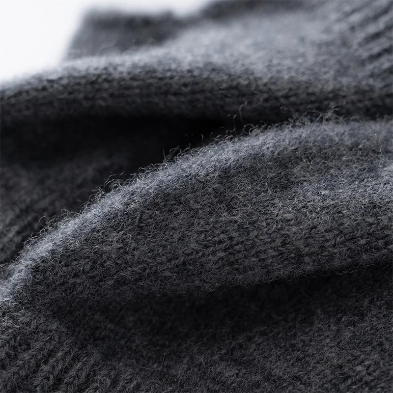 Fashionable women's soft wool knit fingerless gloves, an essential accessory for winter outfits.