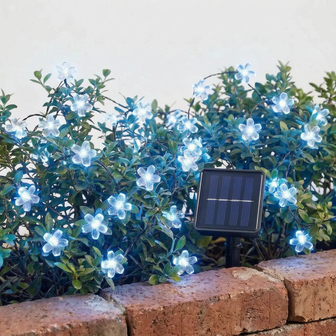 Eco-friendly solar LED flower garden string lights, providing beautiful ambiance & energy savings.