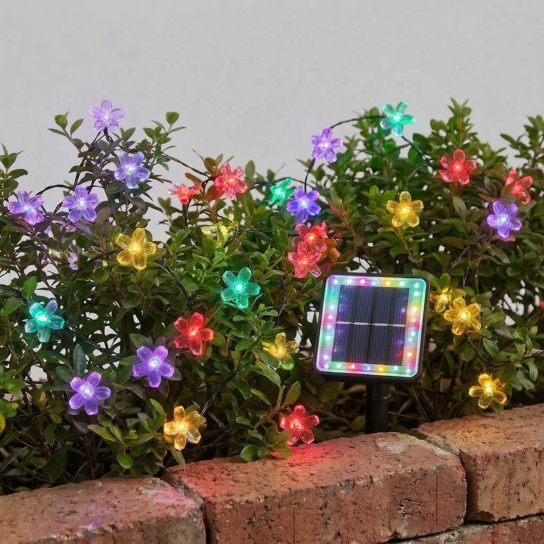 Outdoor solar flower LED string lights, waterproof & decorative for garden, patio, or balcony.