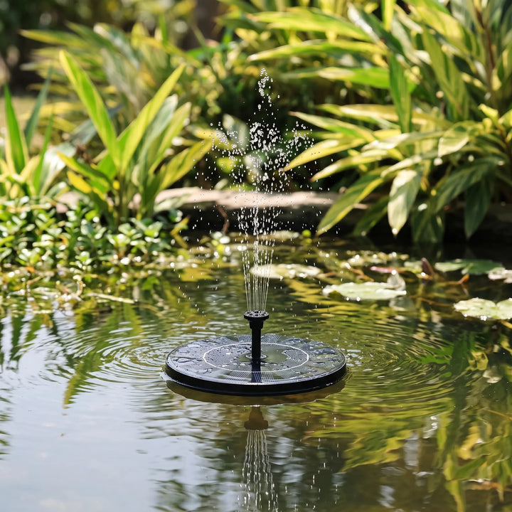 Solar powered floating water fountain adds elegance to ponds & birdbaths. Eco-friendly garden decor.