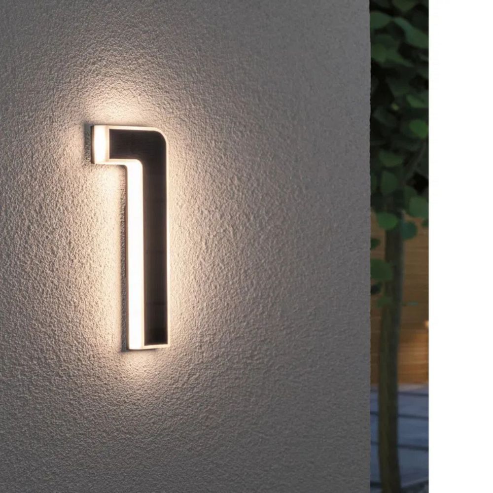 Weatherproof solar illuminated house number for modern home exteriors, enhancing curb appeal.