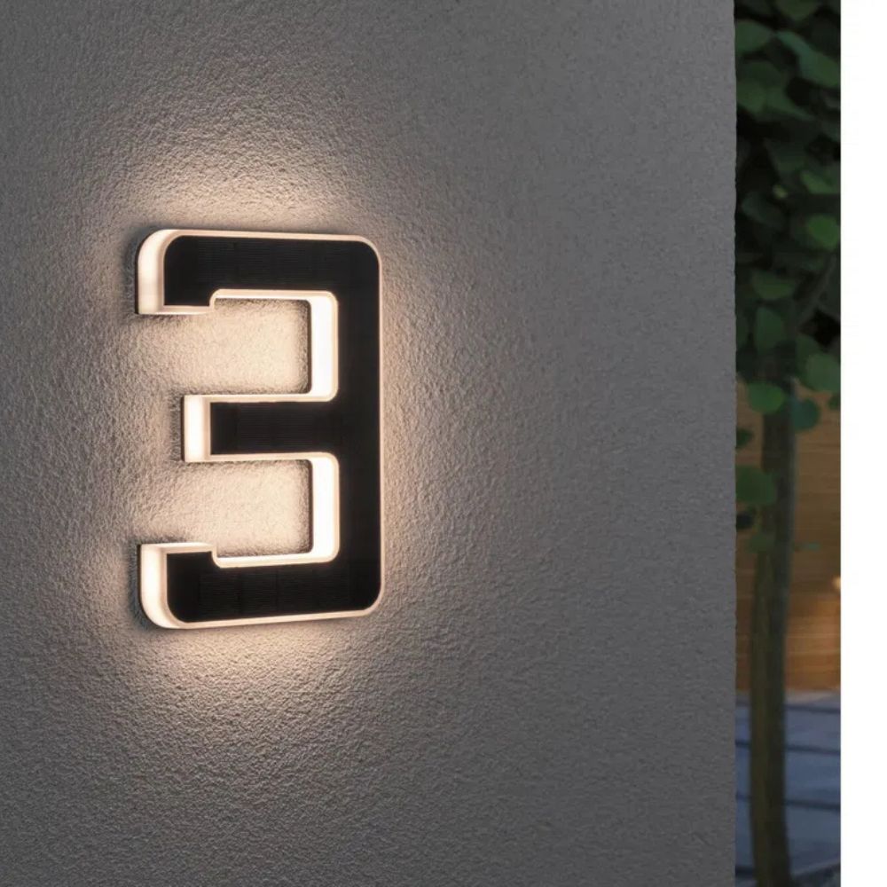 Modern outdoor solar powered illuminated house number, a stylish addition to your home exterior.