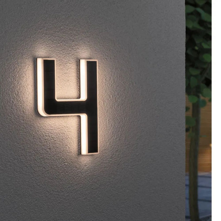 Energy-efficient solar house number with bright LED display, perfect for night visibility & curb appeal.