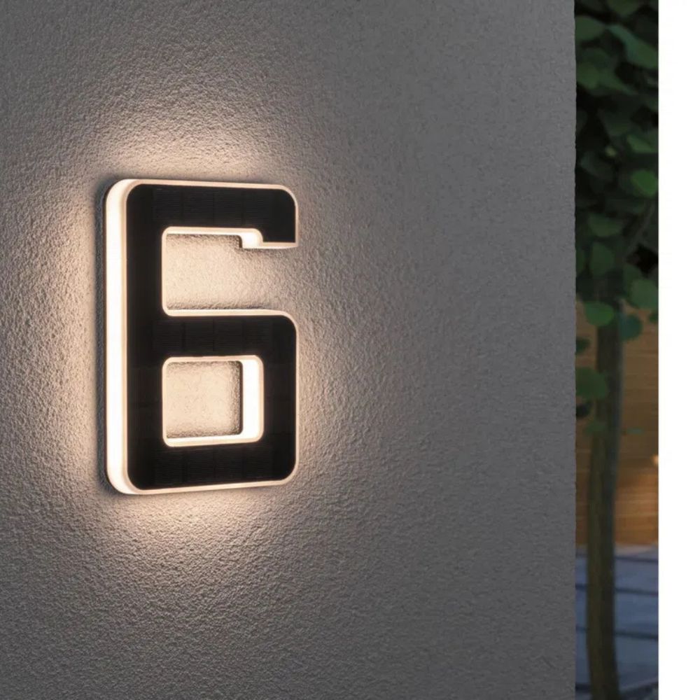 Easy-install solar LED house number, improving night visibility & home exterior aesthetics.