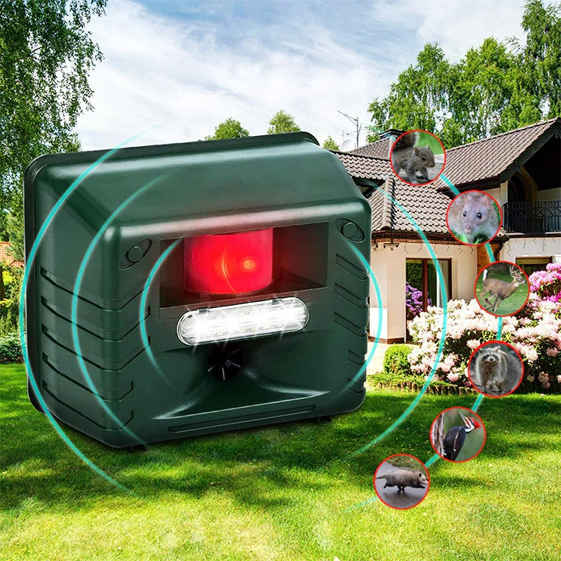 Solar-powered outdoor ultrasonic animal repeller protecting gardens from woodpeckers & pests. Weatherproof yard defender.