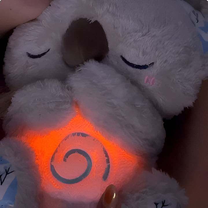 Unisex Koala plush toy with lights, music & breathing motion for kids' anxiety relief & adult calm.