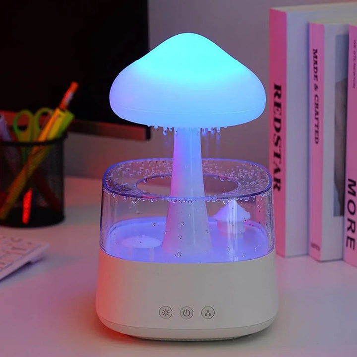 Unique mushroom cloud humidifier with soothing rain sound. LED light creates a calming atmosphere for sleep & relaxation.