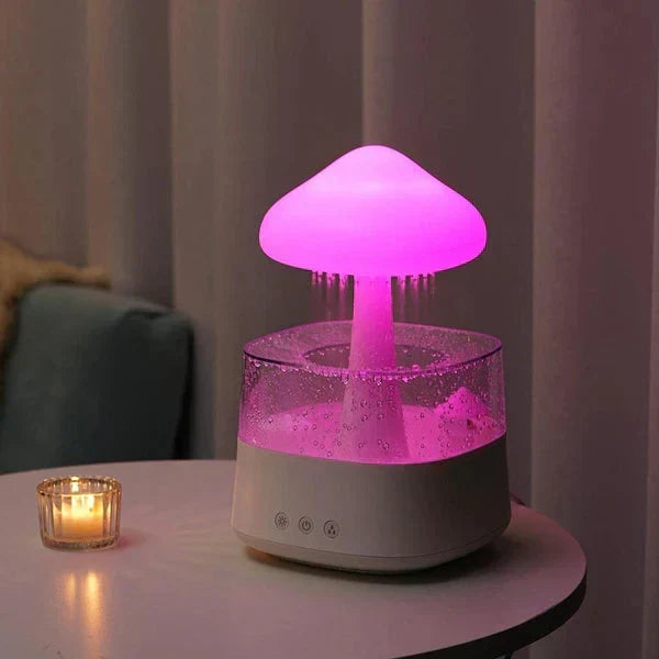 Quiet mushroom cloud rain humidifier, diffuser & air purifier. Features LED light for relaxation & better sleep.