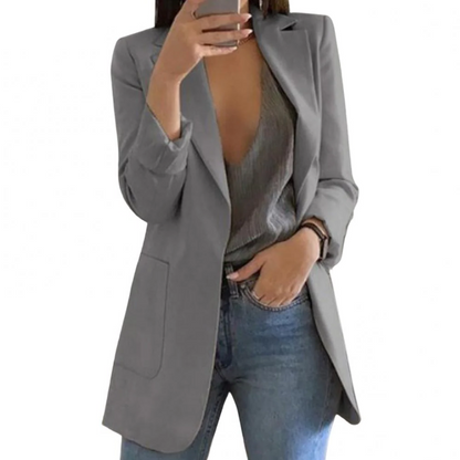 Sophisticated women's long blazer, an elegant jacket for professional office attire and versatile chic fashion.