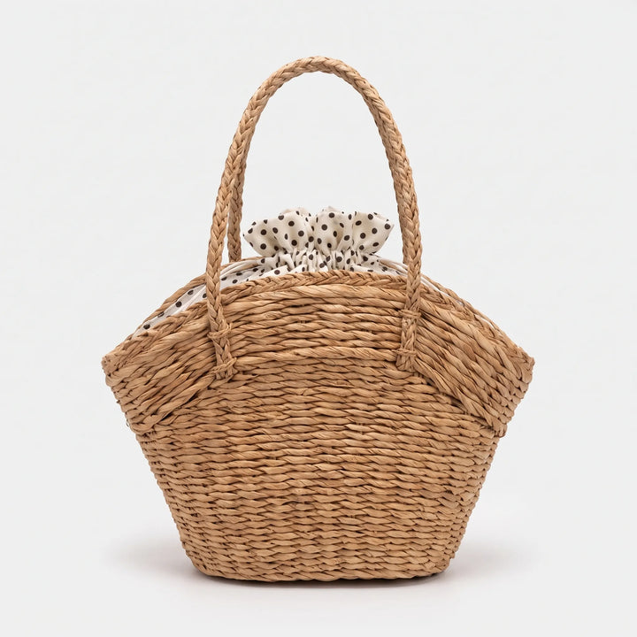 Stylish women's beige summer tote, a spacious and casual shoulder bag, perfect for beach days or a daily carry-all.