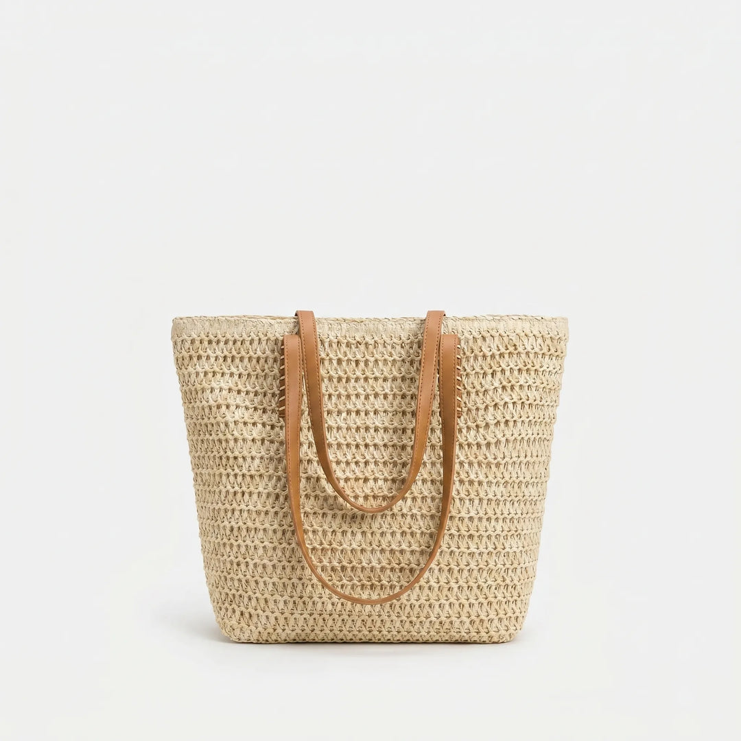 Stylish women's woven tote bag with ample space, ideal for beach trips, casual outings, or everyday use as a handbag.