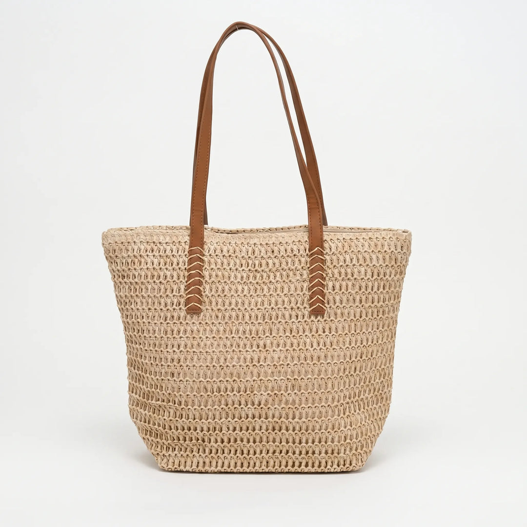 Elegant women's woven beach tote bag, spacious and durable, perfect for carrying all your summer essentials in style.