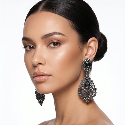 Glamorous women's rhinestone drop earrings, a sparkling statement jewelry piece for formal and evening events.
