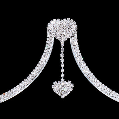 Intricate women's rhinestone chest pendant necklace. Shimmering jewelry accessory adding glamour to any outfit.