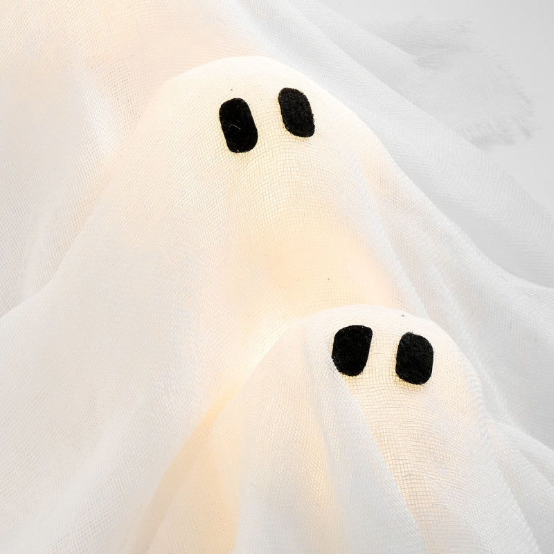 Festive LED light-up Halloween wreath with spooky white ghost decorations, perfect for haunted decor.