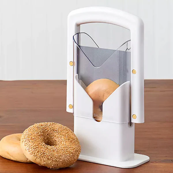 Effortless bagel and bun slicer, a stainless steel kitchen tool for quick and safe breakfast food prep.