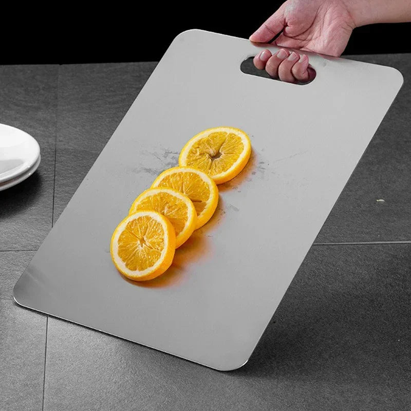 Durable stainless steel chopping board. Hygienic, non-porous surface for safe kitchen food preparation & baking.