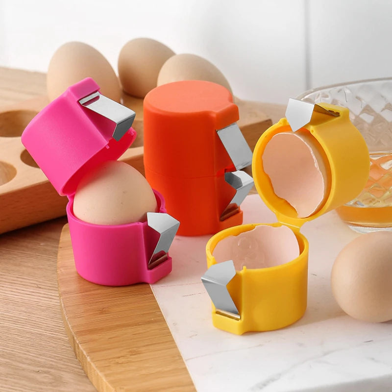 Stainless steel egg cracker tool for mess-free kitchen use. Perfect for baking and cooking breakfast.