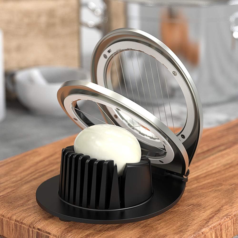 Stainless steel egg slicer with 3 versatile cuts for quick food prep. Perfect kitchen tool.