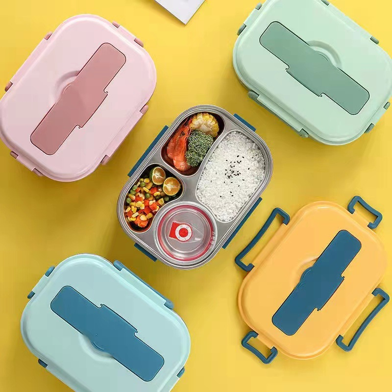 Thermal lunch box, durable stainless steel with compartments for organized meals.