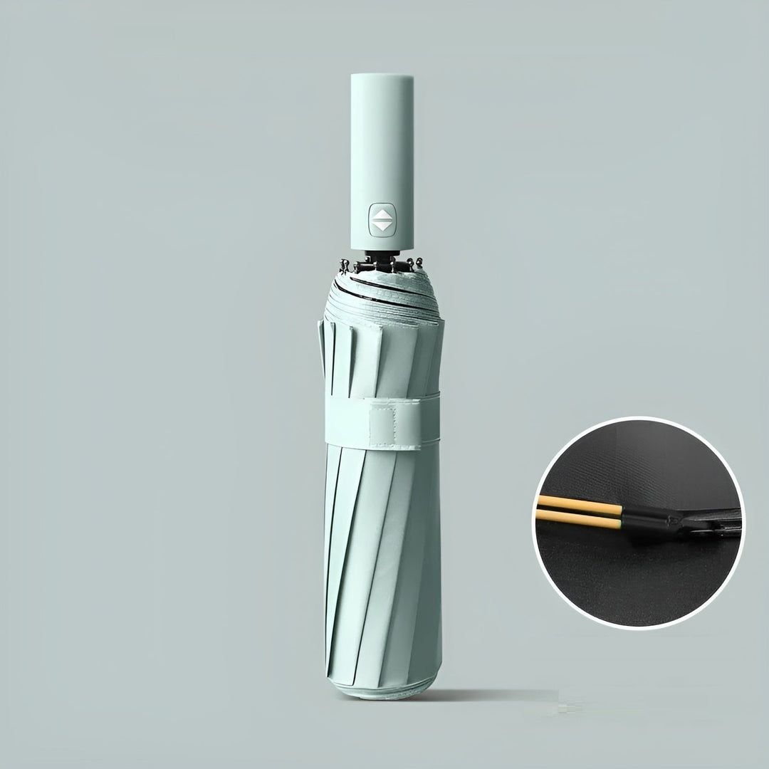 Essential StormShield travel umbrella, compact & strong for any weather condition, UV safe.