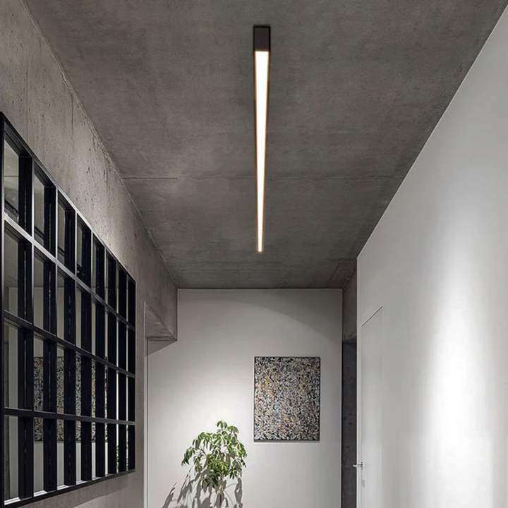 Modern industrial linear LED ceiling light, Stratum design, ideal for contemporary interior lighting.