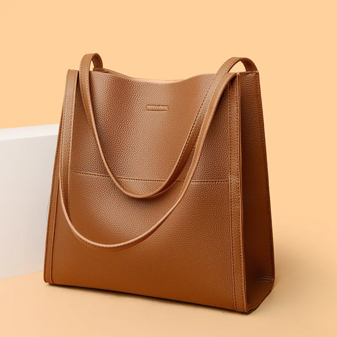 Durable green large leather tote bag, perfect for women seeking daily capacity & style.