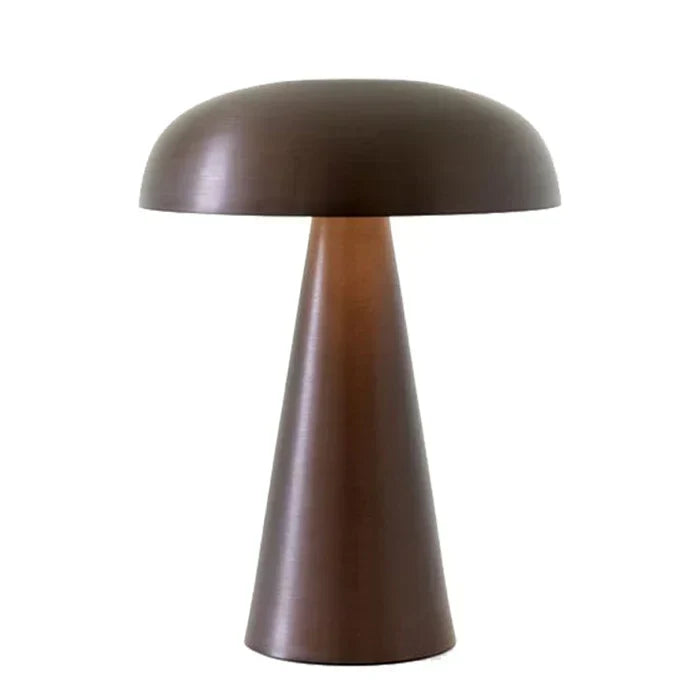 Portable LED table lamp with gold finish, mushroom design. Wireless, rechargeable for modern home lighting.