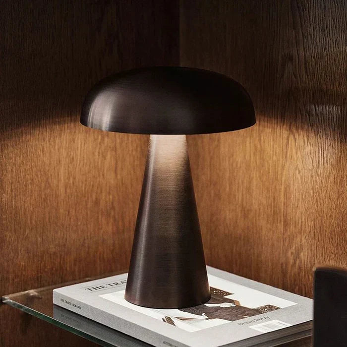 Decorative ShroomLite LED accent lamp, portable gold finish. Rechargeable wireless light for modern ambiance.